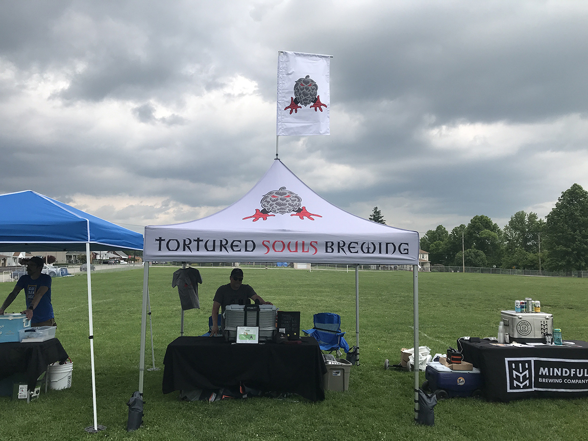 Tortured Souls Brewing shows off its MONARCH peak flag.