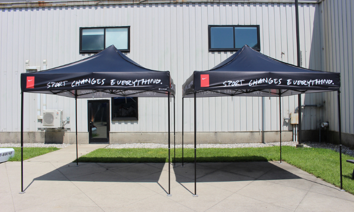 An example of two black, Nike-branded mightyTENTS outside the tentCraft headquarters.