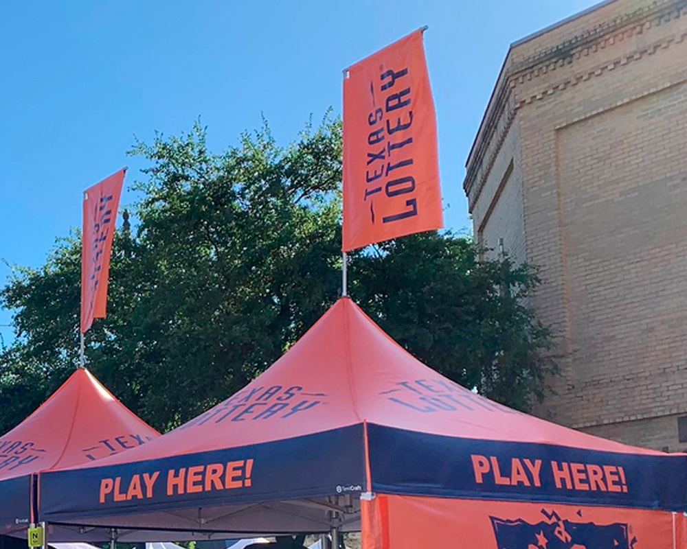 example of a printed peak flag on 10x10 pop up tent model