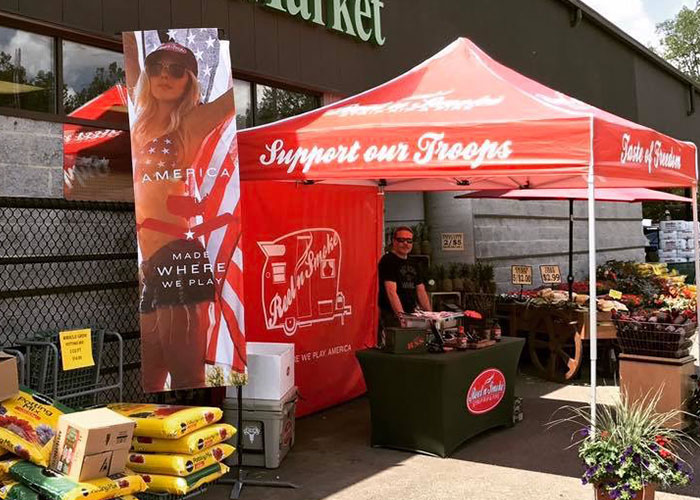 Rectangle marketing flag used at outdoor farmers market.