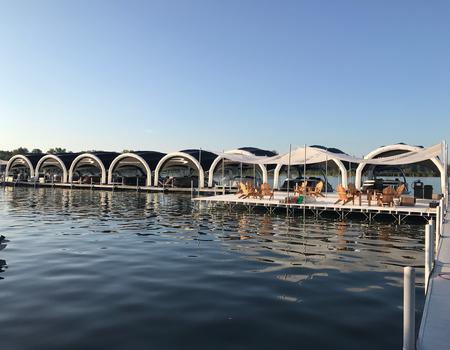 Several Nitrox AIRFRAME inflatable tents used for tent structure at marina.