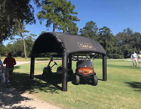 The Nitrox AIRFRAME inflatable tent set-up at Club Car product demo at golf course.
