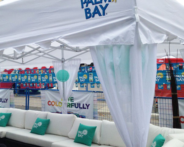 A white tent curtain attached to heavy-duty pop-up tent.